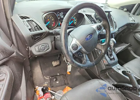 2014 Ford Escape Titanium z USA, uszkodzony, nr VIN 1FMCU9J92EUD62197